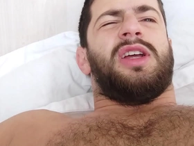 In bed with a hairy hunk - morning wood hard uncut cock - musky ripe pits and bedsheets